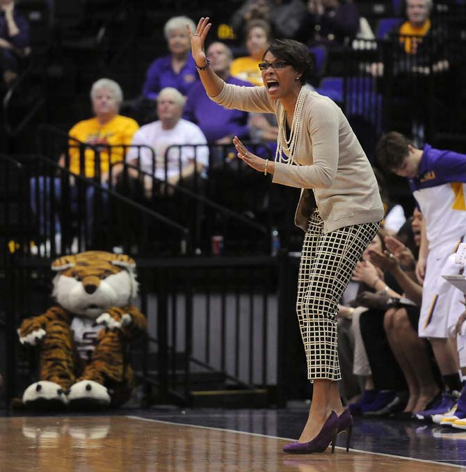 LSU head woman's baskeball coach Nikki Caldwell yells to the players on the court Thursday, Jan. 30, 2013 during the Lady Tigers' 65-56 victory against Mississippi State in the PMAC.