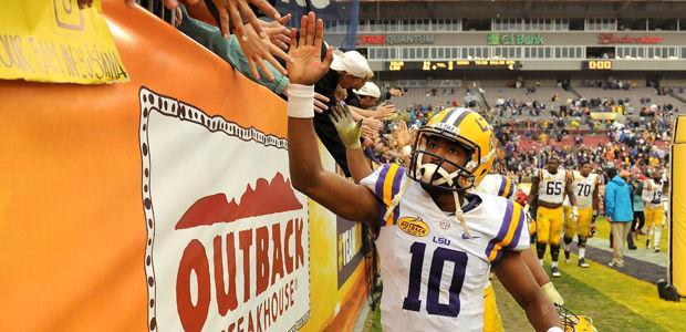 LSU freshman quarterback Anthony Jennings (10) celebrates with fans Wednesday, Jan. 1, 2014 after the Tigers' 21-14 victory against the Iowa Hawkeyes in the Outback Bowl at Raymond James Stadium in Tampa, Florida.