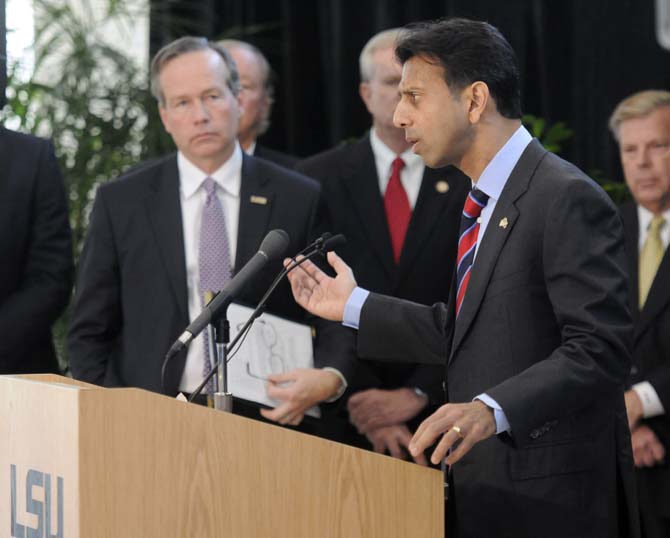 Gov. Bobby Jindal joins leaders from the state's higher education systems to make an announcementabout funding for higher education in Baton Rouge Tuesday, January 21, 2014 at The E. J. Ourso College of Business