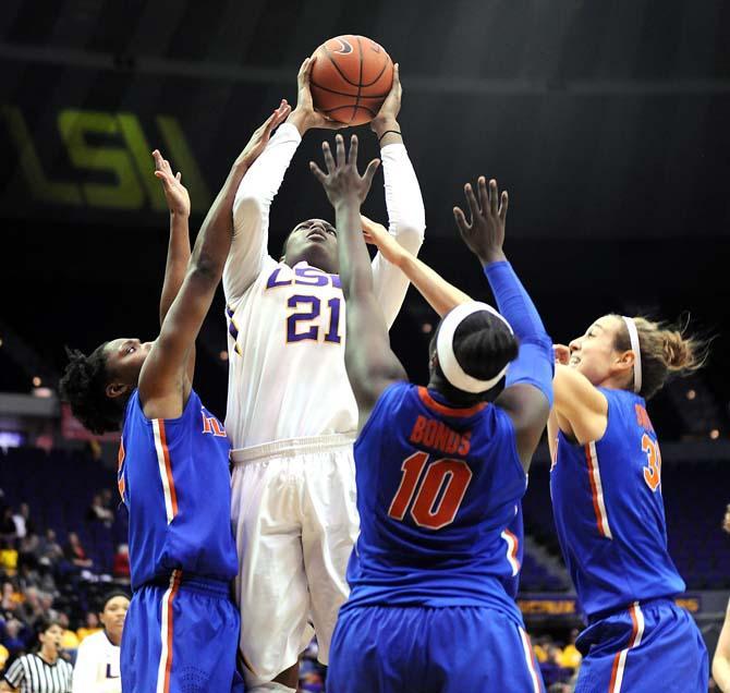 LSU senior forward Shanece McKinney (21) attempts a shot on the net Sunday, Jan. 12, 2014 during the Tigers' 82-68 victory against Florida in the PMAC.