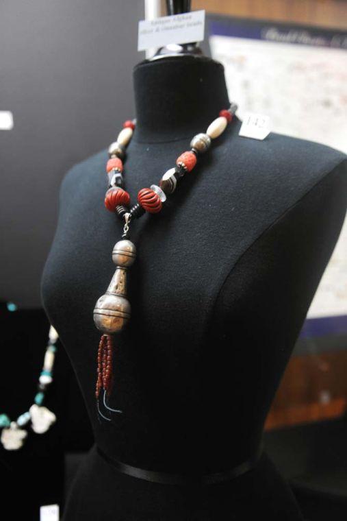 Antique Afghan silver and cinnabar beads are on display for the Knot Just Beads exhibit by bead and fiber artist Jane Olson-Phillips Sunday, January 26, 2014 at the LSU Textile and Costume Museum located in the Human Ecology Building.