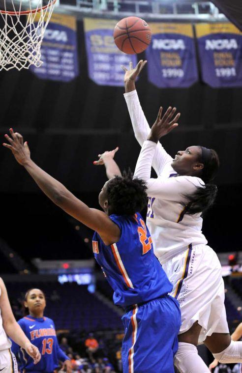 LSU senior forward Shanece McKinney (21) throws the ball toward the basket Sunday, Jan. 12, 2014 during the Tigers' 82-68 victory against Florida in the PMAC.