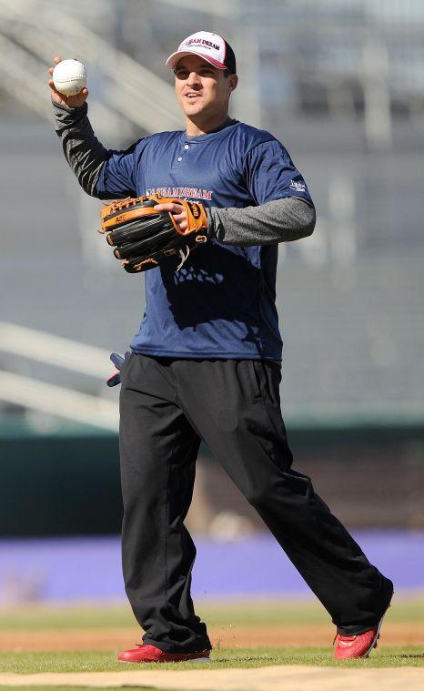 Former LSU baseball player Ryan Theriot throws the ball during the 2 Seam Dream Cancer Awareness Day Home Run Derby on Saturday, January 18th, 2014 during at Alex Box Stadium, Skip Bertman Field.