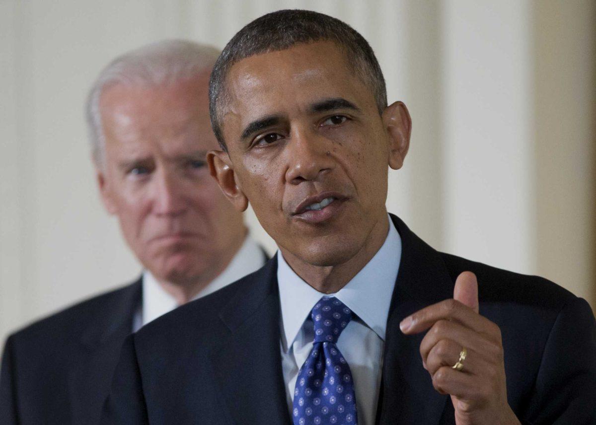 Vice President Joe Biden listens as President Barack Obama speaks in the East Room of the White House in Washington, Wednesday, Jan. 22, 2014, before the president signed a memorandum creating a task force to respond to campus rapes during an event for the Council on Women and Girls. (AP Photo/Carolyn Kaster)