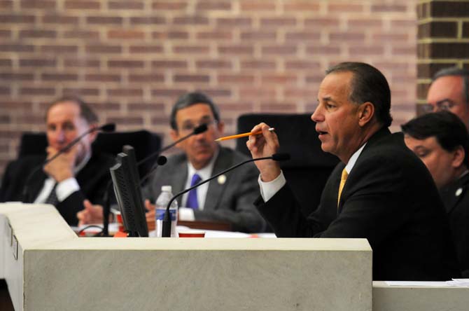 Board of Supervisors member Scott Angelle speaks at a meeting Friday, Jan. 31, 2014 in the System Administration Building.