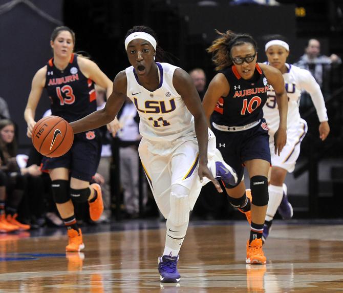 LSU freshman guard Raigyne Moncrief (11) drives toward the goal Thursday, Jan. 23, 2013 during the Lady Tigers' 71-60 victory against Auburn in the PMAC.