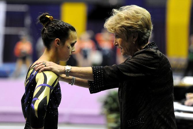 LSU Gymnist, Ashleigh Gnat, receiving a pep talk from Head Coach, DD Breaux, before her performance at the LSU vs Auburn Gym Meet.