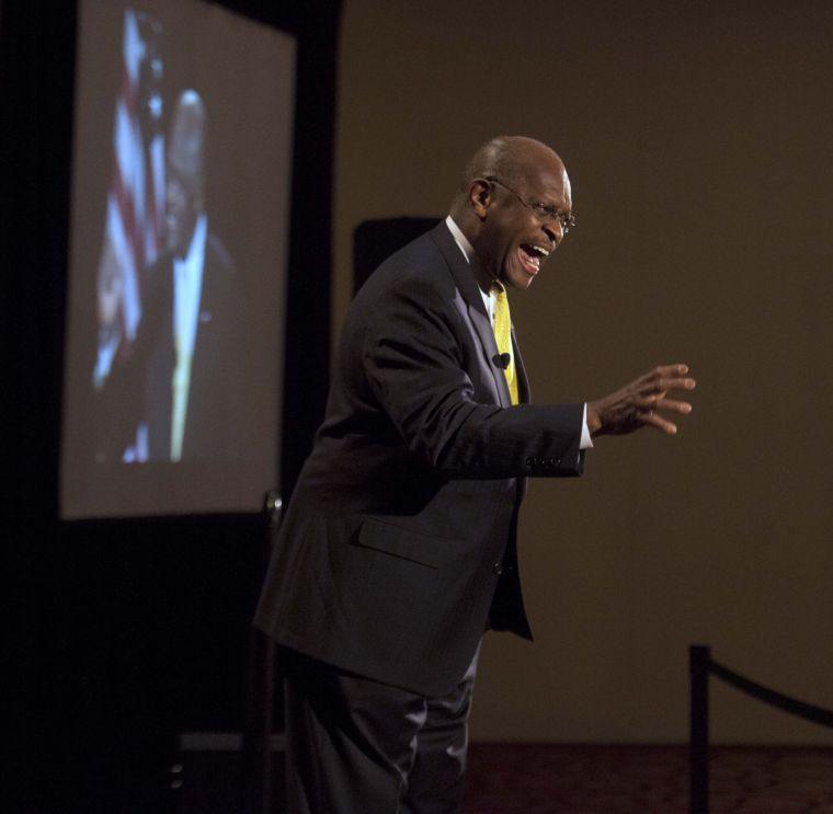 Herman Cain speaks to the people of Baton Rouge at a rally to support the congressional bid for Paul Dietzel on Friday, January 17, 2014 at the Renaissance of Baton Rouge Hotel.