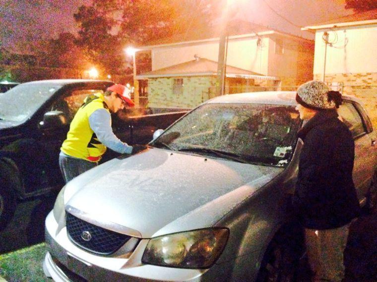 A couple of LSU students fearlessly attempt to keep deadly sneaux off their vehicle.&#160;