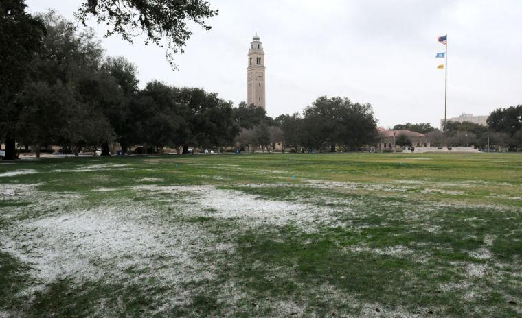 Snow collects on the Parade Ground Tuesday, Jan. 28, 2013 by the Student Union.