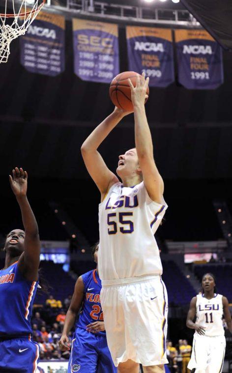 LSU senior forward Theresa Plaisance (55) attempts a shot on the net Sunday, Jan. 12, 2014 during the Tigers' 82-68 victory against Florida in the PMAC.