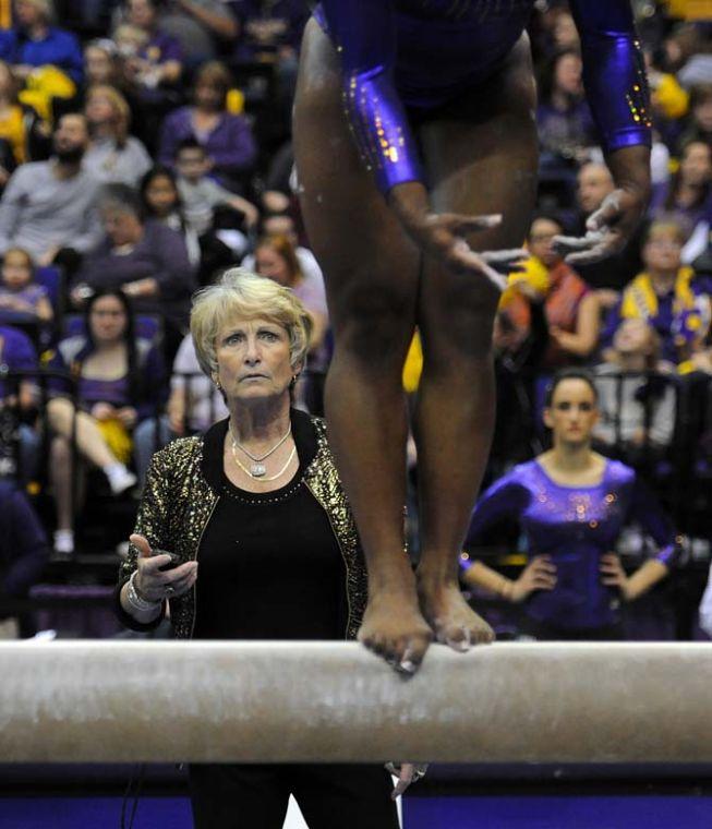 LSU gymnastics head coach D-D Breaux watches her team warm up before the balance beam Friday, Jan. 10, 2014 during the Tigers' 197.200-181.275 win against Centenary in the PMAC.