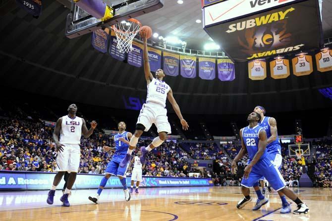 LSU freshman forward Jordan Mickey (25) lays the ball up Tuesday, Jan. 28, 2014 during the Tigers' game against Kentucky in the PMAC.