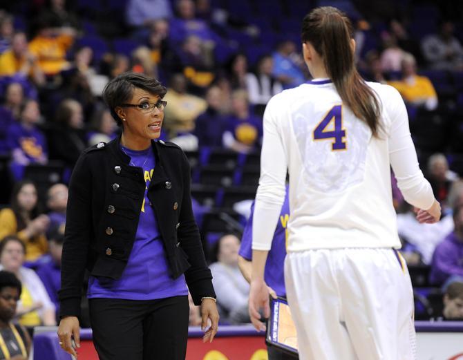 LSU head woman's basketball coach Nikki Caldwell speaks with LSU sophomore guard Anne Pedersen (4) on Thursday, Jan. 23, 2013 during the Lady Tigers' 71-60 victory against Auburn in the PMAC.