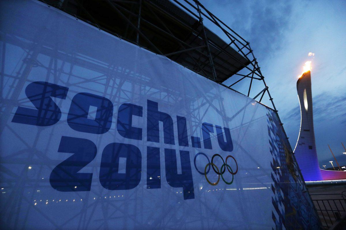 The Olympic torch is tested before the start of the 2014 Winter Olympics in the Olympic Park, Monday, Jan. 27, 2014, in Sochi, Russia. (AP Photo/David J. Phillip)