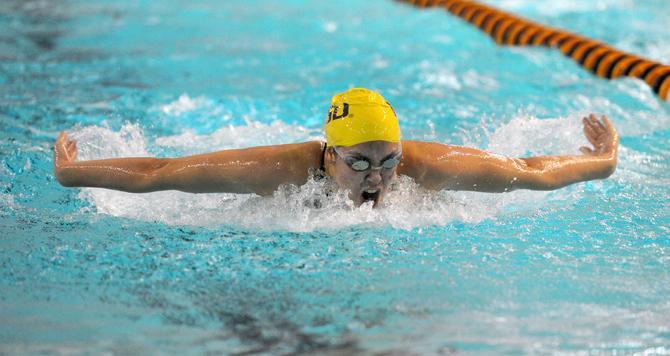 LSU freshman Kara Kopcso sets a pool record Saturday, Jan. 18, 2014 during the Tiger's meet against Texas A&amp;M with her performance in the woman's 100 yard butterfly timed finals in the LSU natatorium.