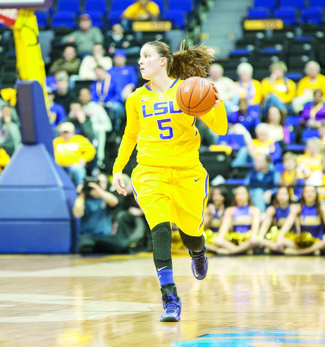 LSU senior guard Jeanne Kenney (5) dribbles down the court January 9, 2014 during the Tigers' 48-52 loss to Texas A&amp;M in the PMAC. She scored a career-high 30 points during LSU's 87-68 win against Missouri in Columbia, Mo.