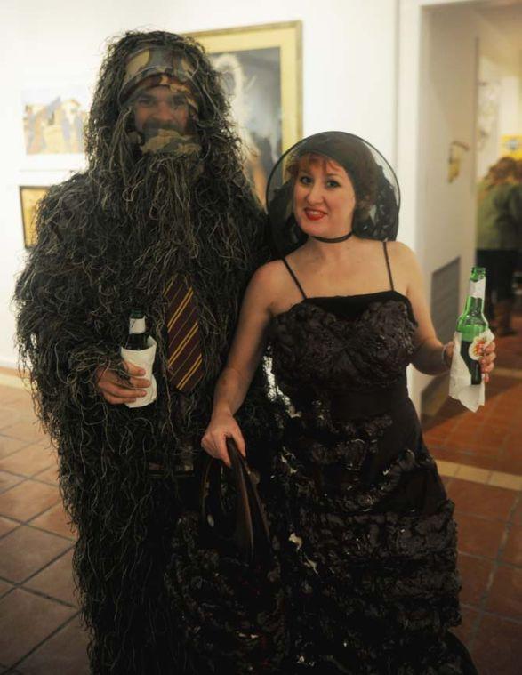 Mathew Rouillier's moss suit and Jessica Sharpe's gloppy mud dress is quite the hit Saturday, January 25, 2014 at the Baton Rouge Gallery for contemporary art to present Surreal Salon Six, a national juried exhibition of pop-surrealist and lowbrow art from across America. This year's exhibition features 80 works from 58 artists representing 20 states.