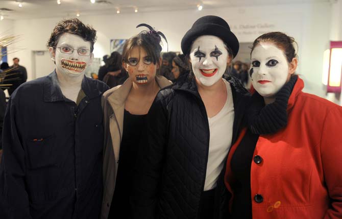 Randal Hart (left) shows off his Dishwasher of Doom costume with his fellow friends as mimes Saturday, January 25, 2014 at the Baton Rouge Gallery for contemporary art to present Surreal Salon Six, a national juried exhibition of pop-surrealist and lowbrow art from across America. This year's exhibition features 80 works from 58 artists representing 20 states.