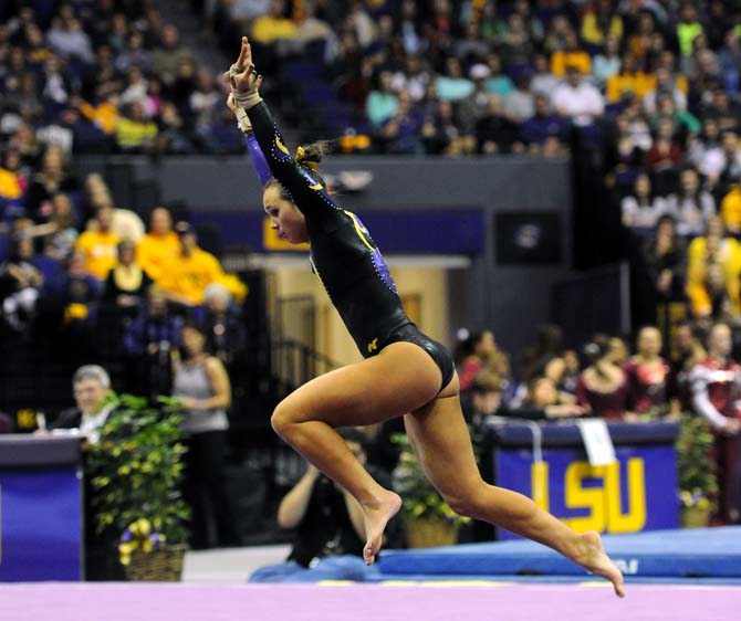 LSU freshman all-around gymnast Ashleigh Gnat prepares to flip across the floor Friday, Jan. 31, 2014 during the Tigers' 197.650-196.825 victory against Alabama in the PMAC.