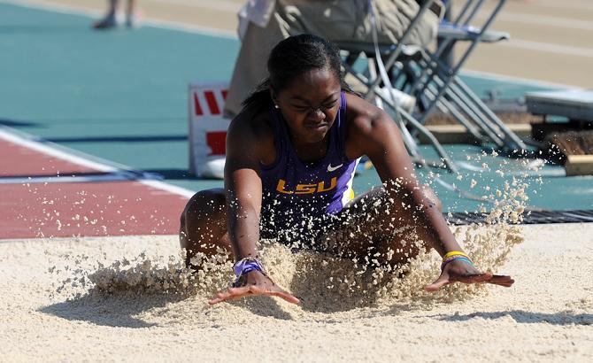 LSU junior Mariah Georgetown lands the long jump Saturday, April 20, 2013 during the LSU Alumni Gold meet at Bernie Moore Track Stadium.