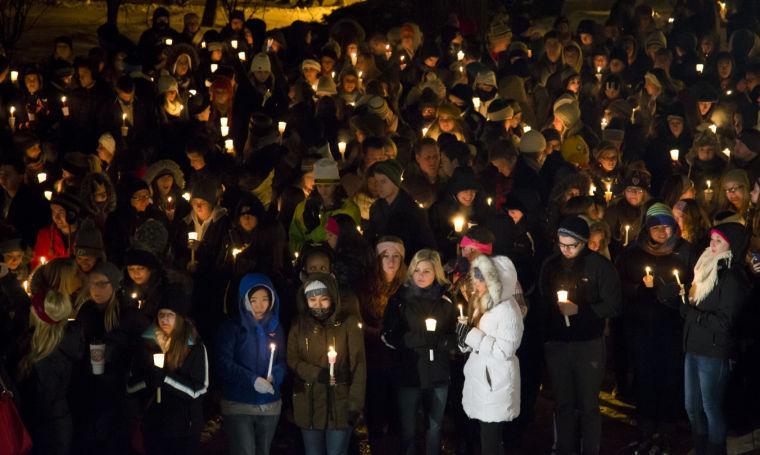 Purdue University students, faculty, family and friends gather at the steps of Hovde Hall for a vigil for a teaching assistant who was fatally shot on campus at Purdue University, on Tuesday, Jan. 21, 2014, in West Lafayette, Ind. The victim was identified as Andrew Boldt, 21, a senior in electrical engineering from Wisconsin who lived on campus, according to Purdue. Another student, Cody Cousins, was arrested on a preliminary charge of murder, athourities said. (AP Photo/The Journal &amp; Courier, Michael Heinz) MANDATORY CREDIT; NO SALES