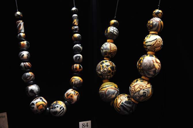 Polymer clay-coated ping pong ball beads are on display for the Knot Just Beads exhibit by bead and fiber artist Jane Olson-Phillips Sunday, January 26, 2014 at the LSU Textile and Costume Museum located in the Human Ecology Building.