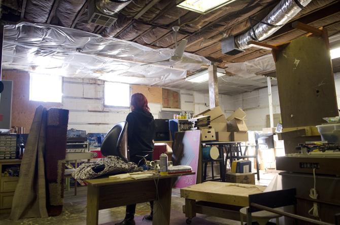 The Atomic Pop Shop's owner, Kerry Beary, standing in the room being renovated to expand the shopping area of the store currently.