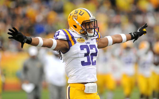 LSU sophomore cornerback Jalen Collins (32) dances to a Tiger Band tune Wednesday, January 1, 2014 during the Tigers' 21-14 victory against Iowa in the Outback Bowl at Raymond James Stadium in Tampa, Florida.