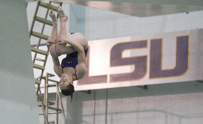 LSU freshman diver Katie Lagarde back flips Saturday, Jan. 18, 2013 during the Tiger's meet with Texas A&amp;M in the LSU natatorium.