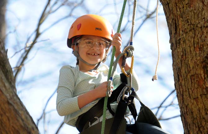 Alice Leotta, age 8, participates in a tree climbing event during Arbor Day at Burden on Saturday, Jan. 18, 2014 at the LSU AgCenter Botanic Gardens.