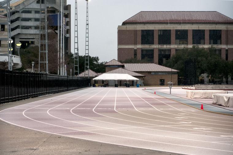 Ice covers the track of Bernie Moore Stadium on Tuesday, Jan. 28, 2014.