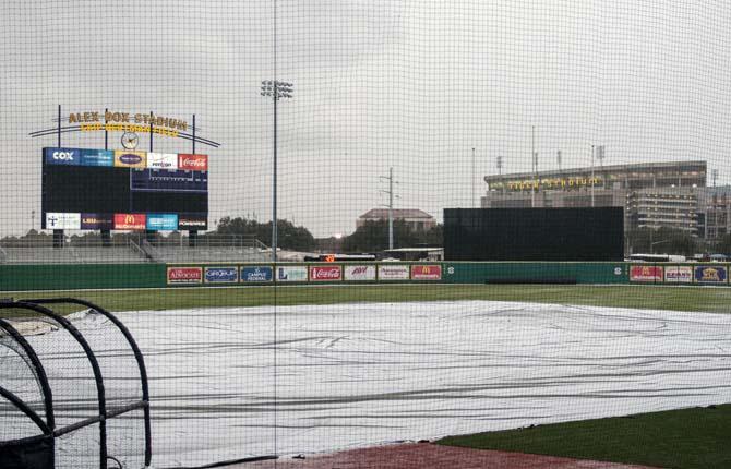 Ice covers the infield tarp in Alex Box Stadium on Tuesday, Jan. 28, 2014.