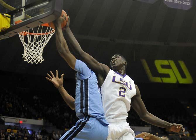 LSU junior forward Johnny O'Bryant III (2) blocks a Rhode Island shot Saturday, Jan. 4, 2014 during the Tigers' 70-74 loss to the Rams in the PMAC.