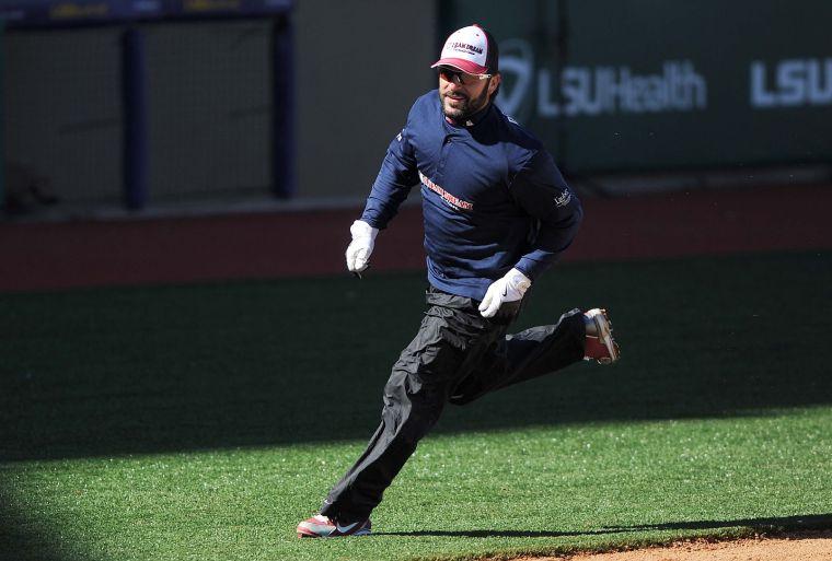 Former LSU baseball player Todd Walker runs to home plate Saturday, January 18th, 2014 during the 2 Seam Dream Cancer Awareness Day Home Run Derby at Alex Box Stadium, Skip Bertman Field.