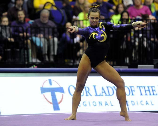 LSU freshman all-around gymnast Ashleigh Gnat dances during her floor routine Friday, Jan. 31, 2014 during the Tigers' 197.650-196.825 victory against Alabama in the PMAC.