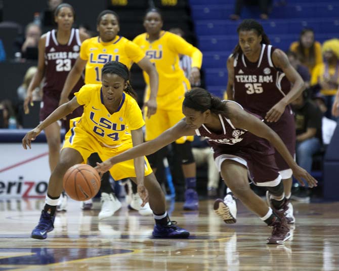 LSU junior guard DeShawn Harden (24) steals the ball from Texas A&amp;M sophomore guard Jordan Jones (24) Thursday, January 9, 2014 during the Lady Tigers' 48-52 loss to Texas A&amp;M