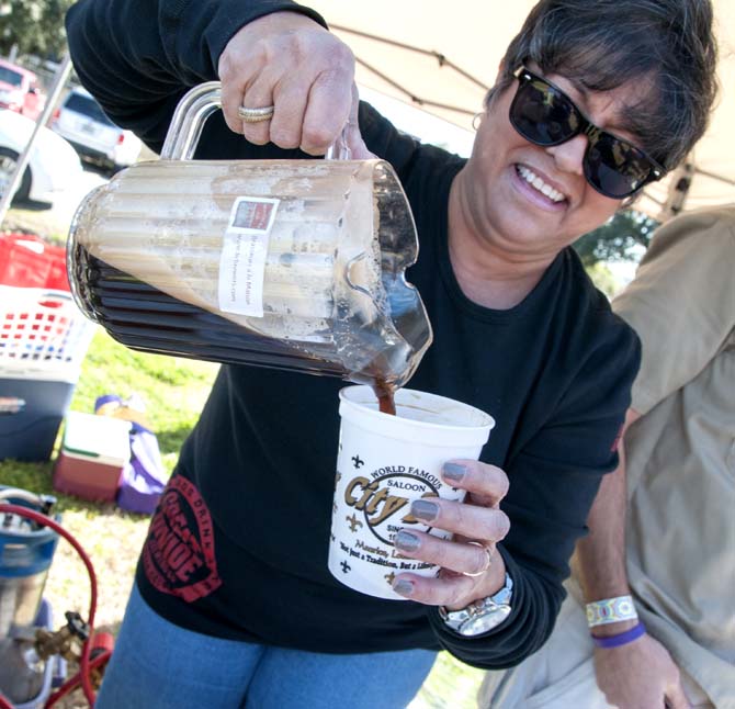 A brewer pours beer from a pitcher Saturday, Feb. 15, 2014 during the 2014 Brasseurs a la Maison Iron Brewer Festival at Tin Roof Brewing Company in Baton Rouge.