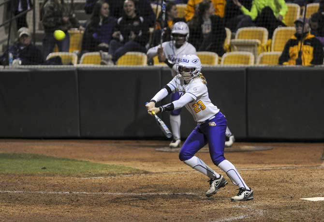 LSU senior outfielder Jacee Blades (23) hits the ball Saturday, Feb. 8, 2014 during the Tigers' 1-0 win against Oklahoma State in Tiger Park.