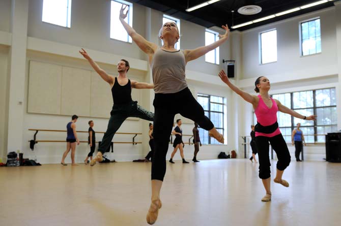 Members of River North Dance Chicago perform floor exercises Monday, Feb. 10, 2014, in the Music and Dramatic Arts Building.