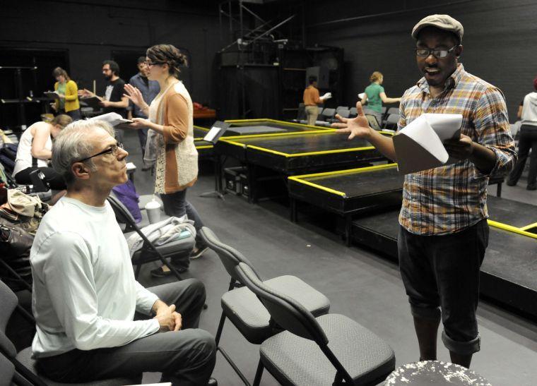 Douglas Mungin and cast rehearse for the interactive portion for Sojourn Theatre&#8217;s &#8220;How to End Poverty in 60 Minutes&#8221; on Wednesday evening, Feb. 19, 2014 in the HopKins Black Box Theatre at 137 Coates Hall.