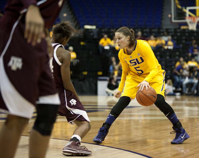 LSU senior guard Jeanne Kenney (5) takes on Texas A&amp;M sophomore guard Jordan Jones (24) Thursday, January 9, 2014 during the Lady Tigers' 48-52 loss to Texas A&amp;M.