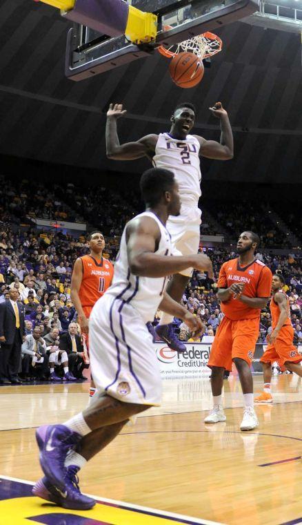 LSU junior forward Johnny O'Bryant III performs a dunk Saturday, Feb. 8, 2013 during the Tigers' 87-80 victory against the Auburn Tigers in the PMAC.