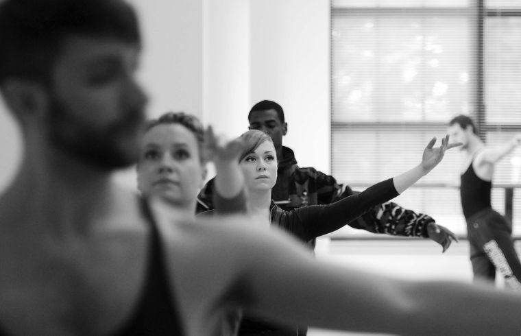 Members of River North Dance Chicago perform bar exercises Monday, Feb. 10, 2014, in the Music and Dramatic Arts Building.