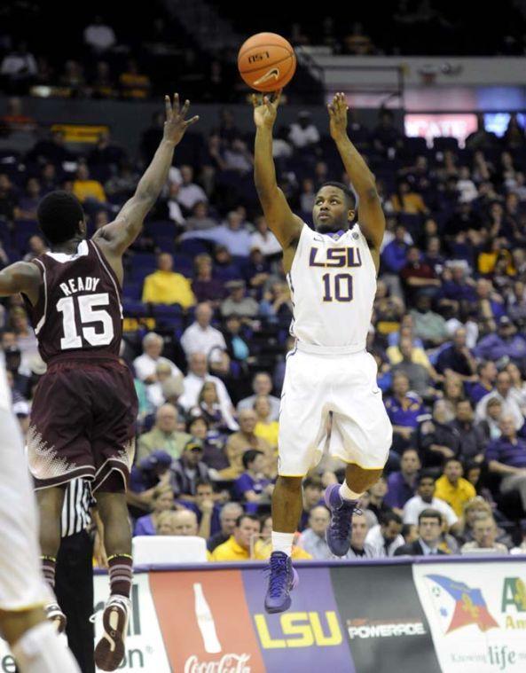 LSU senior guard Andre Stringer (10) shoots the ball Wednesday Feb. 19, 2014 during the Tigers' 92-81 victory against Mississippi State in the PMAC.