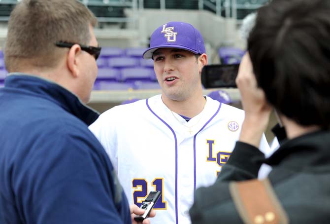 LSU junior pitcher Joe Broussard (21) speaks to reporters Friday, Jan. 31, 2014 during the annual Baseball Media Day at Alex Box Stadium.