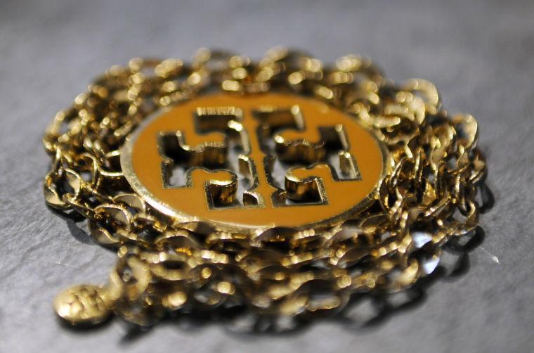 A Tory Burch necklace.