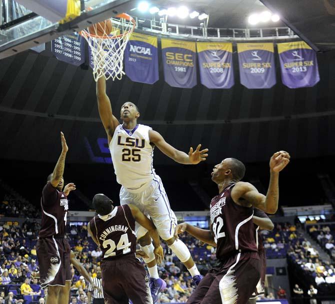 LSU freshman forward Jordan Mickey (25) lays up the ball Wednesday Feb. 19, 2014 during the Tigers' 92-81 victory against Mississippi State in the PMAC.