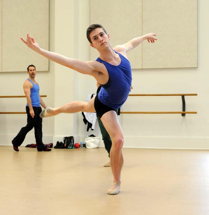 A member of River North Dance Chicago performs a floor exercise Monday, Feb. 10, 2014 in the Music and Dramatic Arts Building.