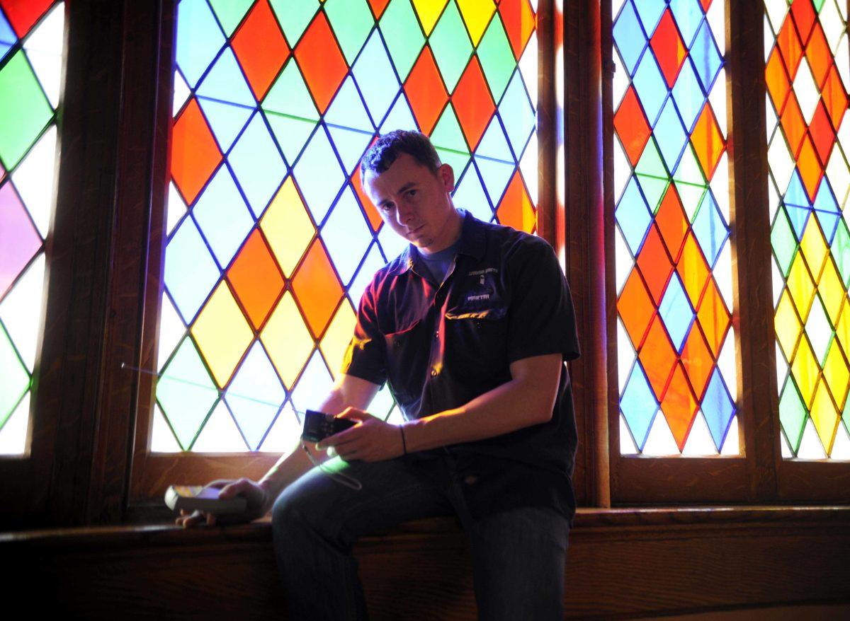 Martin DeLatte is equipped with his EKG meter and his radio wave monitor for evidence of paranormal activity Friday afternoon, Feb. 14, 2014 in the Louisiana Old State Capitol.